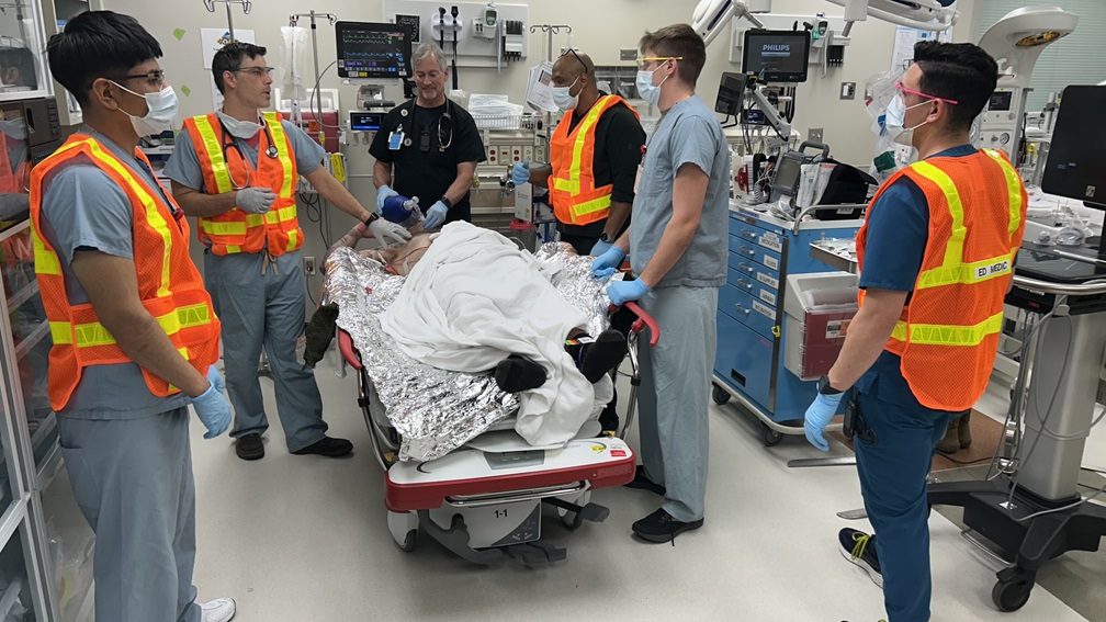 The Evans Army Community Hospital Emergency Department team discusses treatment options for an exercise casualty, during a comprehensive mass casualty (MASCAL) exercise May 8. The Exercise tested the hospital’s ability to receive and treat casualties and determine appropriate levels of care.
